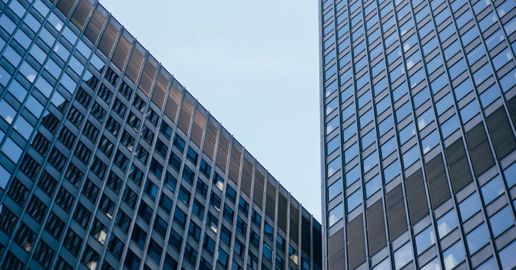 Low angle view of modern skyscrapers in Chicago, showcasing urban architecture.